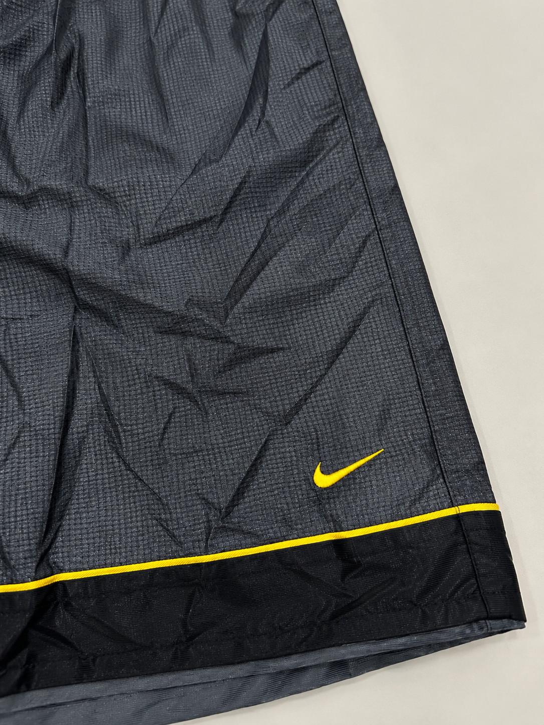 Nike Men's Grey & Black Athletic Shorts with Yellow Swoosh Size - L