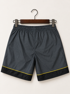 Nike Men's Grey & Black Athletic Shorts with Yellow Swoosh Size - L