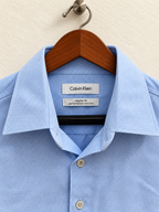 Calvin Klein Men's Light Blue Performance Non-Iron Long Sleeve Dress Shirt